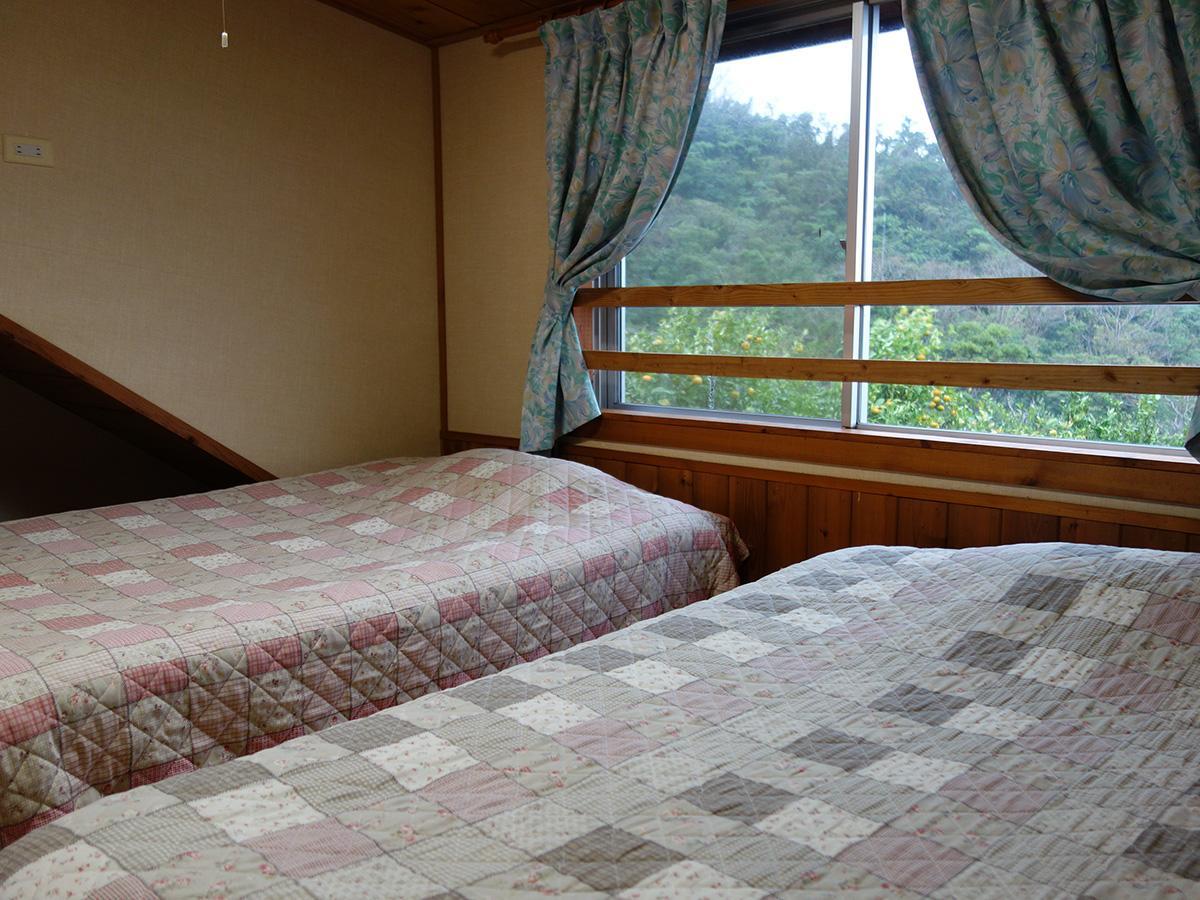 Log Pension Izumigamori Motobu Buitenkant foto